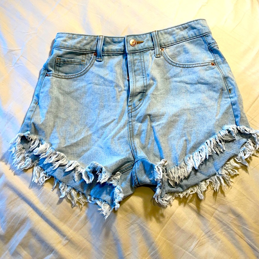 High waisted denim shorts with fringe